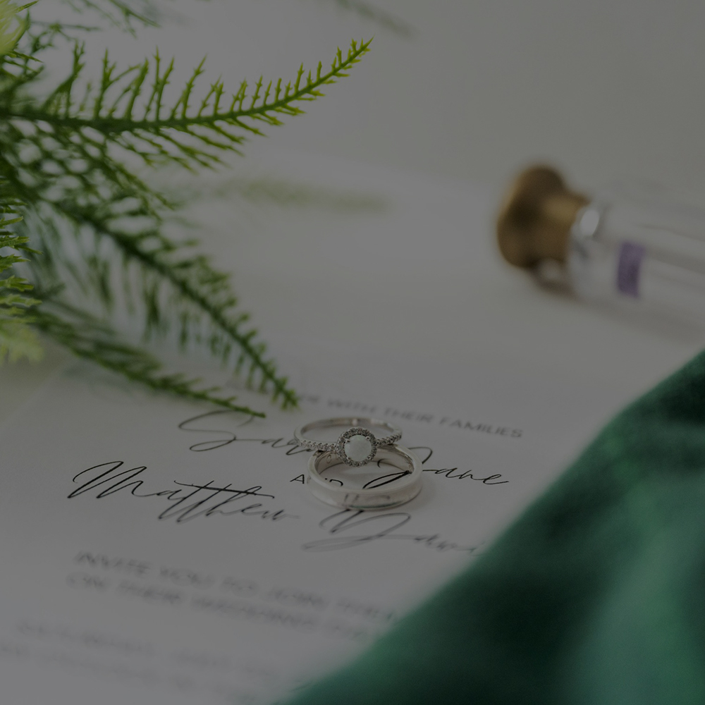 Wedding rings and invitation